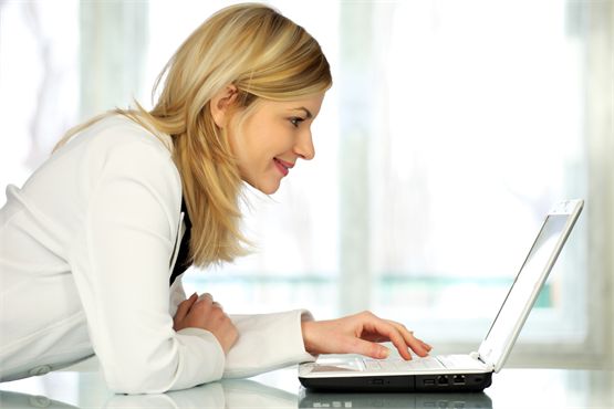 Woman at laptop - for Find an RD tab on homepage